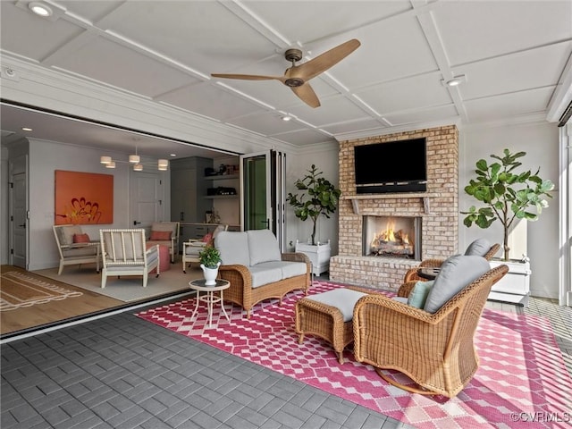 511 Libbie Ave Unit C, Richmond, VA 23226 - living room with a ceiling fan, a fireplace, and crown molding
