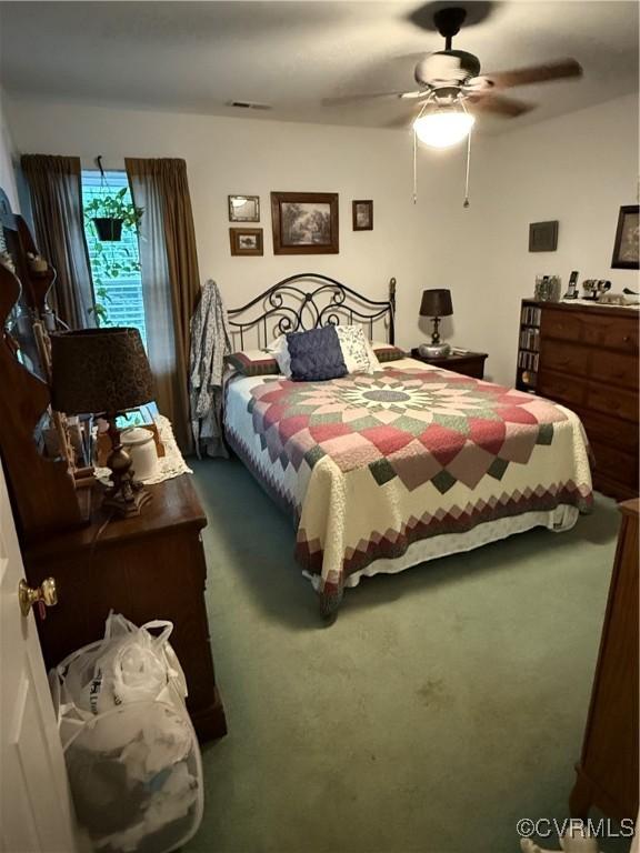 9812 Nott Ln, Chesterfield, VA 23832 - carpeted bedroom featuring a ceiling fan