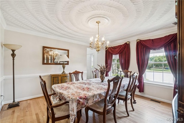 1413 N Mill Point Ct, Suffolk, VA 23434 - dining room with a chandelier, light wood-style floors, and ornamental molding