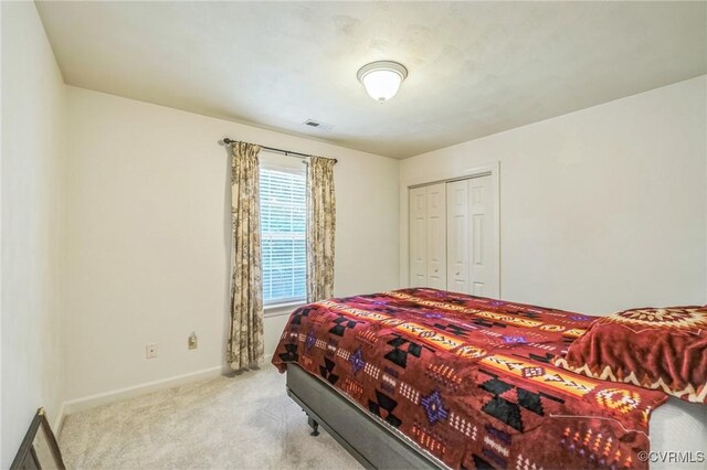 1413 N Mill Point Ct, Suffolk, VA 23434 - carpeted bedroom featuring baseboards and a closet