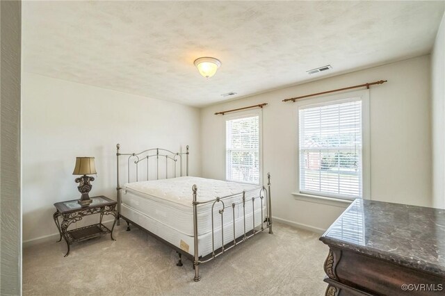 1413 N Mill Point Ct, Suffolk, VA 23434 - bedroom with light colored carpet and baseboards