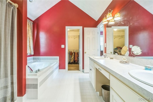 1413 N Mill Point Ct, Suffolk, VA 23434 - full bath featuring lofted ceiling, a spacious closet, a garden tub, tile patterned flooring, and double vanity