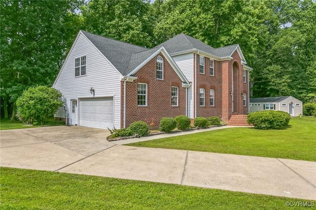 1413 N Mill Point Ct, Suffolk, VA 23434 - traditional home with an attached garage, concrete driveway, a front lawn, and brick siding