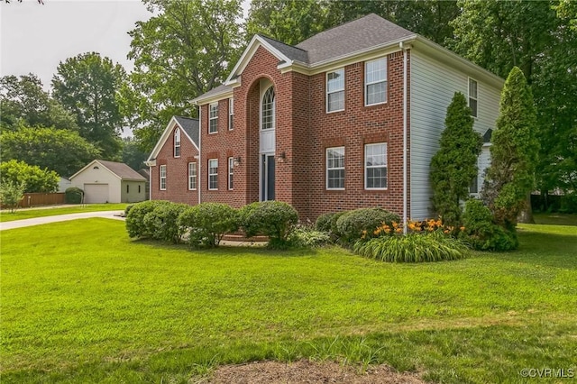 1413 N Mill Point Ct, Suffolk, VA 23434 - view of front of house featuring a front lawn, brick siding, and a garage