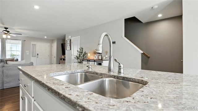 1954 Kennington Park Rd, Aylett, VA 23009 - kitchen featuring white cabinets, light stone countertops, a ceiling fan, recessed lighting, and dark wood-style flooring