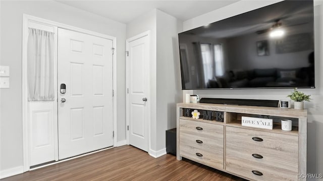 1954 Kennington Park Rd, Aylett, VA 23009 - foyer featuring dark wood-type flooring and baseboards