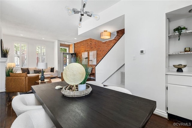 118 N Lombardy St, Richmond, VA 23220 - dining area with dark wood-style flooring, recessed lighting, and brick wall