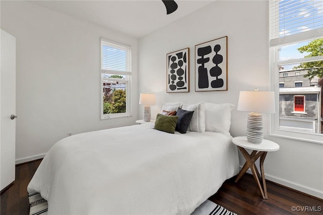 118 N Lombardy St, Richmond, VA 23220 - bedroom featuring dark wood-style flooring, baseboard heating, and a ceiling fan