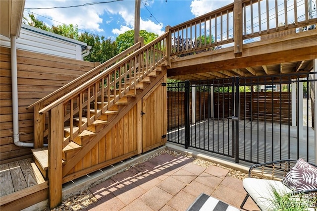 118 N Lombardy St, Richmond, VA 23220 - gate featuring stairway and a wooden deck