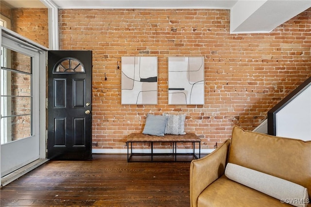 118 N Lombardy St, Richmond, VA 23220 - foyer with hardwood / wood-style flooring, brick wall, and plenty of natural light