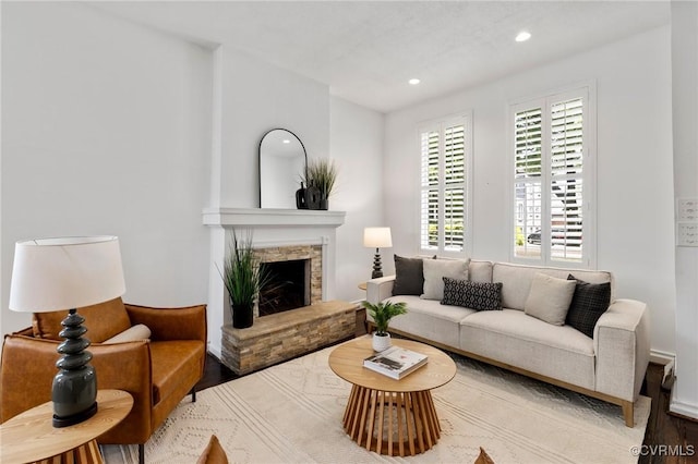118 N Lombardy St, Richmond, VA 23220 - living room featuring wood finished floors, recessed lighting, and a stone fireplace