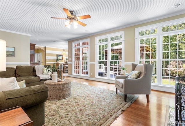 8707 Taylor Landing Pl, Chesterfield, VA 23838 - living area with ceiling fan, ornamental molding, plenty of natural light, and light wood-style floors