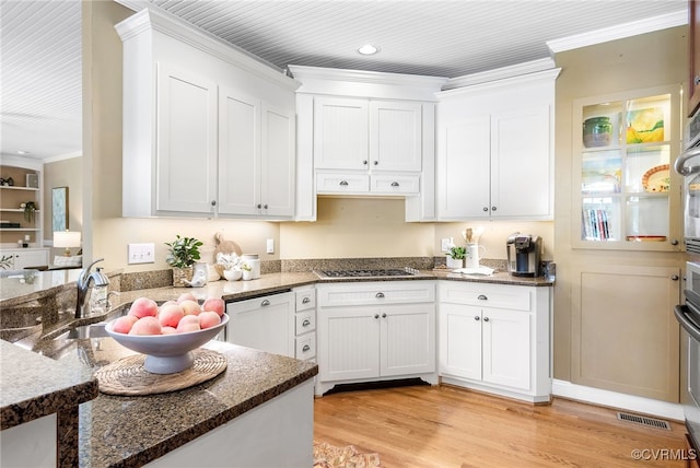 8707 Taylor Landing Pl, Chesterfield, VA 23838 - kitchen with ornamental molding, white cabinets, dark stone counters, light wood-type flooring, and recessed lighting
