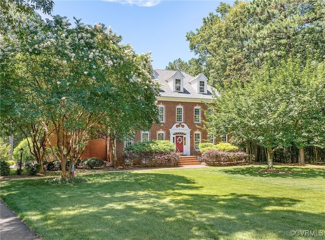 8707 Taylor Landing Pl, Chesterfield, VA 23838 - georgian-style home with a front yard and brick siding