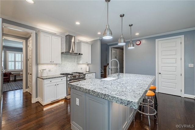 2449 Gold Leaf Cir, Henrico, VA 23233 - kitchen featuring stainless steel stove, wall chimney exhaust hood, dark wood-style flooring, light stone countertops, and crown molding