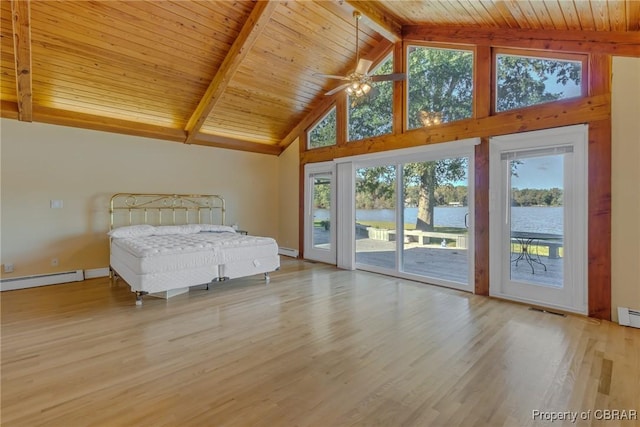 585 White Hall Rd, Montross, VA 22520 - unfurnished bedroom featuring a wood ceiling with exposed beams, access to exterior, a water view, light wood finished floors, and baseboard heating