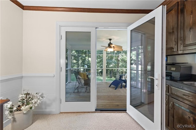 14230 Netherfield Dr, Midlothian, VA 23113 - doorway featuring crown molding, a ceiling fan, a wainscoted wall, and light colored carpet