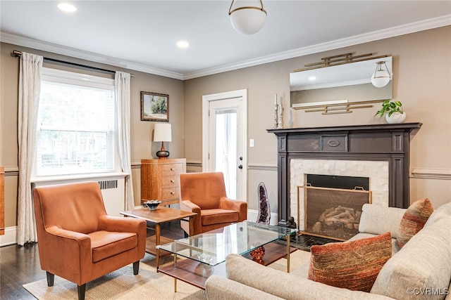 5005 Caledonia Rd, Richmond, VA 23225 - living room featuring wood finished floors, plenty of natural light, a fireplace, ornamental molding, and recessed lighting
