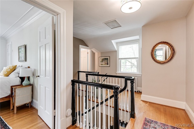 5005 Caledonia Rd, Richmond, VA 23225 - corridor featuring an upstairs landing, light wood-type flooring, and vaulted ceiling
