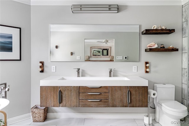 5005 Caledonia Rd, Richmond, VA 23225 - full bath with double vanity, ornamental molding, and a ceiling fan