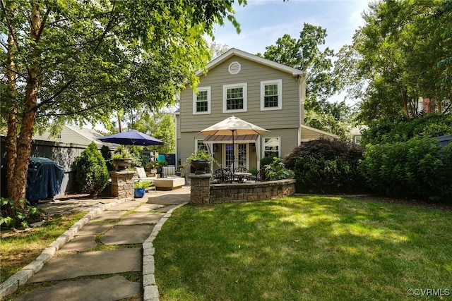 5005 Caledonia Rd, Richmond, VA 23225 - rear view of property with a patio