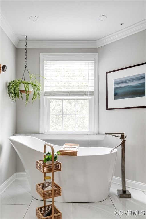 5005 Caledonia Rd, Richmond, VA 23225 - bathroom with a freestanding tub, tile patterned flooring, and crown molding