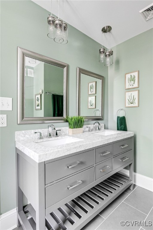 5005 Caledonia Rd, Richmond, VA 23225 - full bath with double vanity and tile patterned flooring