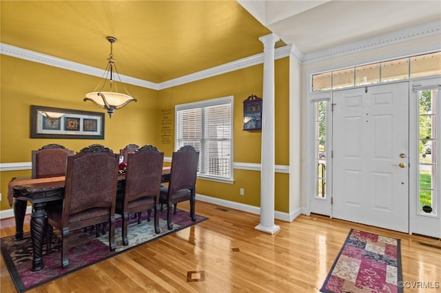 301 Enon Oaks Ln, Chesterfield, VA 23836 - dining area featuring decorative columns, light wood-style floors, and ornamental molding