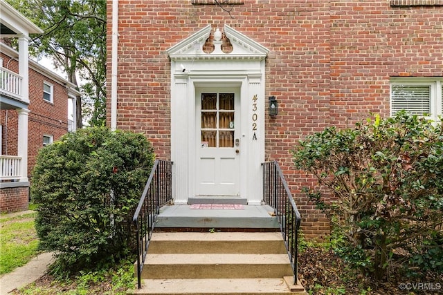 4302 W Franklin St, Richmond, VA 23221 - doorway to property featuring brick siding