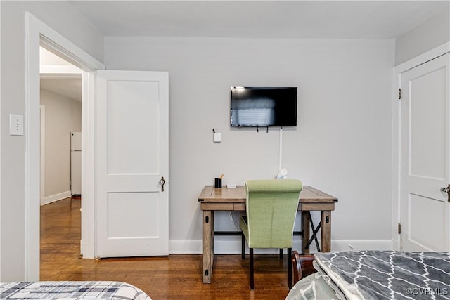 4302 W Franklin St, Richmond, VA 23221 - bedroom with freestanding refrigerator and wood finished floors