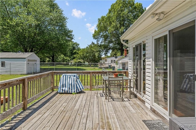 503 S Holly Ave, Henrico, VA 23075 - wooden terrace with outdoor dining area, a fenced backyard, and an outdoor structure