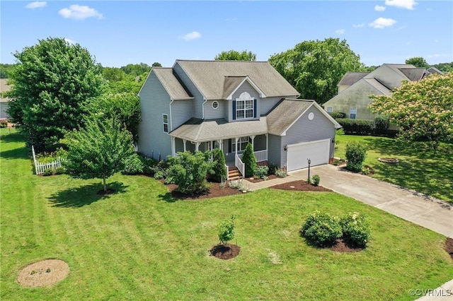 135 Hobbs Hole Ln, Tappahannock, VA 22560 - traditional home featuring an attached garage, driveway, a porch, and a front yard