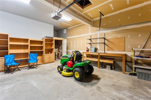 135 Hobbs Hole Ln, Tappahannock, VA 22560 - garage featuring a garage door opener and a workshop area