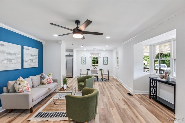 5318 Pine Hill Rd, Sutherland, VA 23885 - living room featuring crown molding, light wood-type flooring, a ceiling fan, and recessed lighting