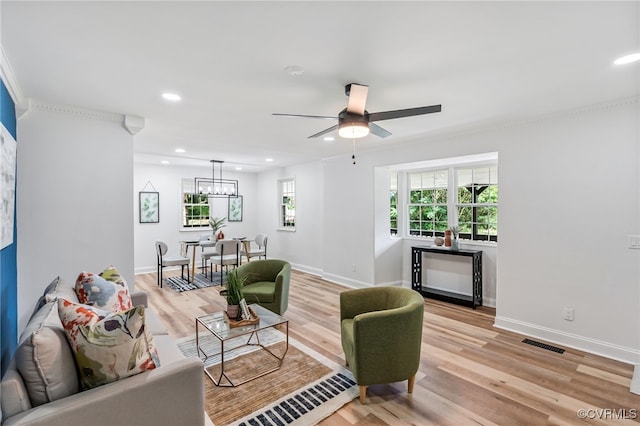5318 Pine Hill Rd, Sutherland, VA 23885 - living area with a ceiling fan, light wood-style floors, recessed lighting, and a chandelier