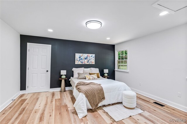 5318 Pine Hill Rd, Sutherland, VA 23885 - bedroom with light wood-type flooring and recessed lighting