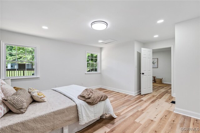 5318 Pine Hill Rd, Sutherland, VA 23885 - bedroom with light wood-style floors and recessed lighting