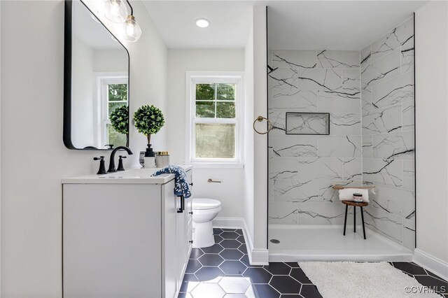 5318 Pine Hill Rd, Sutherland, VA 23885 - full bathroom with vanity, a marble finish shower, tile patterned flooring, and recessed lighting