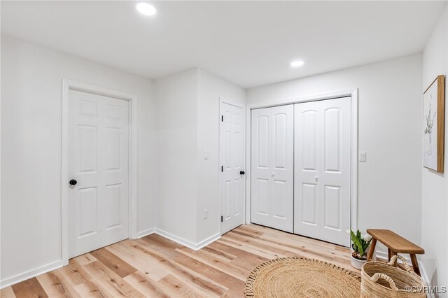 5318 Pine Hill Rd, Sutherland, VA 23885 - bedroom featuring light wood-style floors, recessed lighting, and a closet