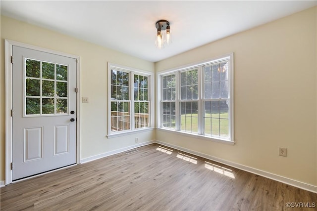 11556 New Forest Trl, Chesterfield, VA 23112 - unfurnished dining area featuring baseboards and wood finished floors