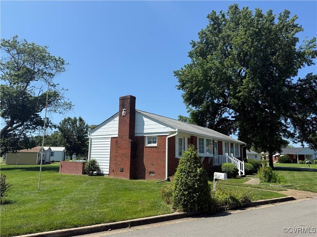 4901 Clayton Rd, Henrico, VA 23231 - ranch-style home with a chimney, crawl space, a front lawn, and brick siding