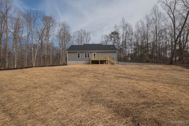 275 Grooms Ln, Louisa, VA 23093 - rear view of house featuring a wooden deck, stairs, and a lawn