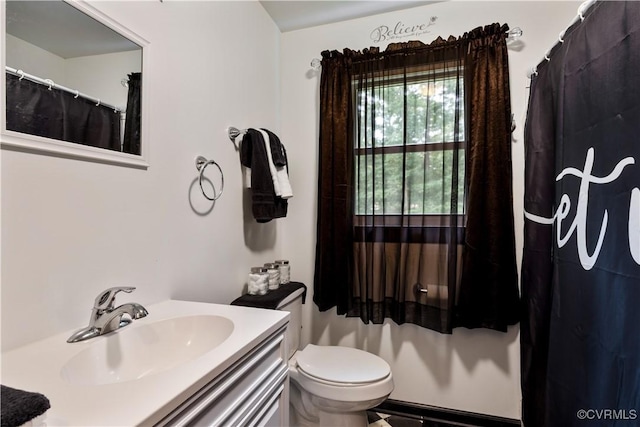 5743 Sara Kay Dr, Chesterfield, VA 23237 - bathroom featuring vanity, a baseboard radiator, and a shower with curtain