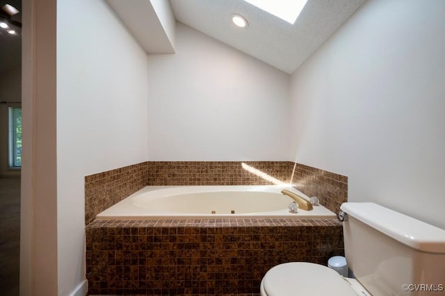 12931 River Hills Dr, Richmond, VA 23111 - bathroom with a jetted tub, lofted ceiling, and recessed lighting