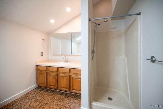 12931 River Hills Dr, Richmond, VA 23111 - full bath with vanity, a shower, lofted ceiling, and recessed lighting