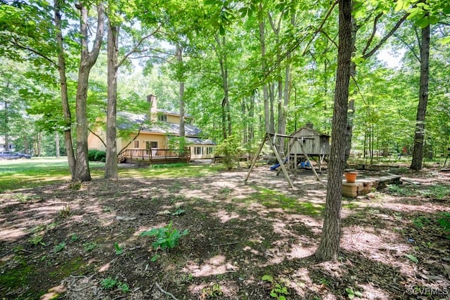 12931 River Hills Dr, Richmond, VA 23111 - view of yard featuring a deck and a playground
