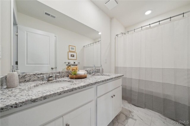 6112 Whisperwood Dr, Chesterfield, VA 23234 - full bathroom featuring marble look tile flooring, double vanity, a shower with shower curtain, and recessed lighting