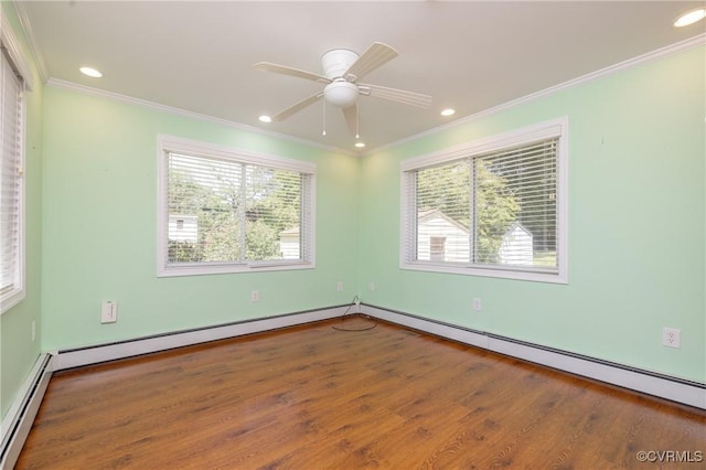 9201 Claymont Dr, Henrico, VA 23229 - empty room featuring a baseboard radiator, crown molding, healthy amount of natural light, wood finished floors, and recessed lighting