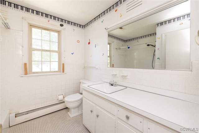 9201 Claymont Dr, Henrico, VA 23229 - full bathroom featuring a baseboard radiator, tile walls, a shower, tile patterned flooring, and vanity