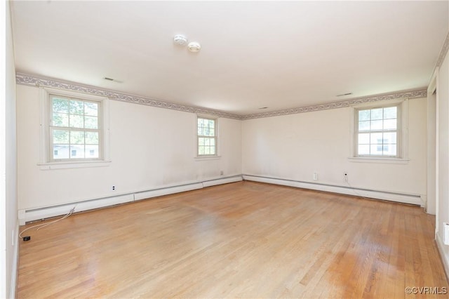 9201 Claymont Dr, Henrico, VA 23229 - unfurnished room with wood finished floors, baseboard heating, and a baseboard heating unit